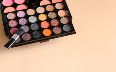 A multicolored set of shadows and blush. Cosmetics for girls and women.