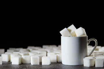 Sugar cubes with mug cup