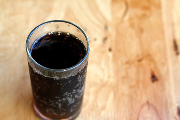 Glass cup of cola drink