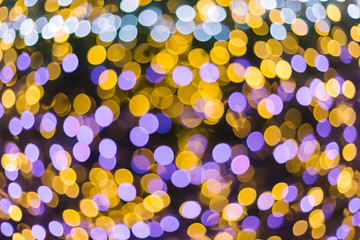 Colorful light Abstract circular bokeh of Christmas and happy new year background.