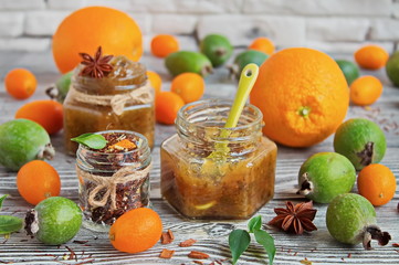 Tropical fruit preserves. Homemade jam from feijoa with orange in a glass jar