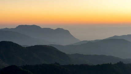 Fototapeta na wymiar Lanscape nature beautiful sunrise on top of thailand mountain