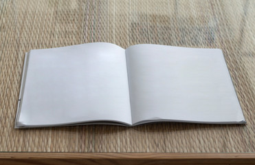 blank page of magazine on table