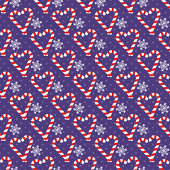 Christmas seamless pattern with candy canes in the shape of a heart and snowflakes. Vector background for wrapping paper, fabric print, greeting cards design
