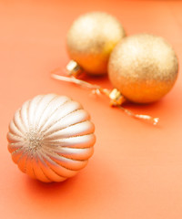 christmas decoration toys on orange background