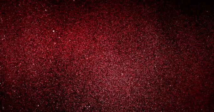 christmas red gradient sparkle glitter explosion dust particles background with bokeh flowing movement, holiday happy new year and valentine day love, relationship concept