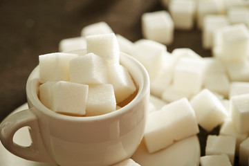 Sugar cubes and coffee cup 
