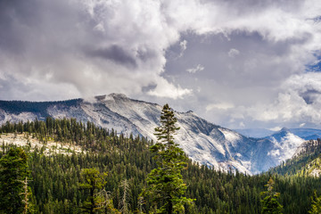 View towards Clouds' Rest summit in Yosemite National Park, dramatic clouds covering the sky; California