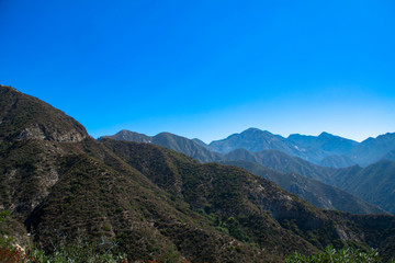 Fototapeta na wymiar A panorama of the San Gabriel Mountains as taken from Mount Wilson near Glendale, California