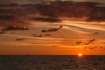 Horizon view angle of Sunset sun down moment at beach