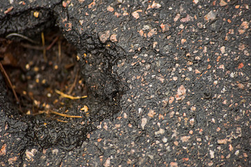 Hole in the asphalt surface