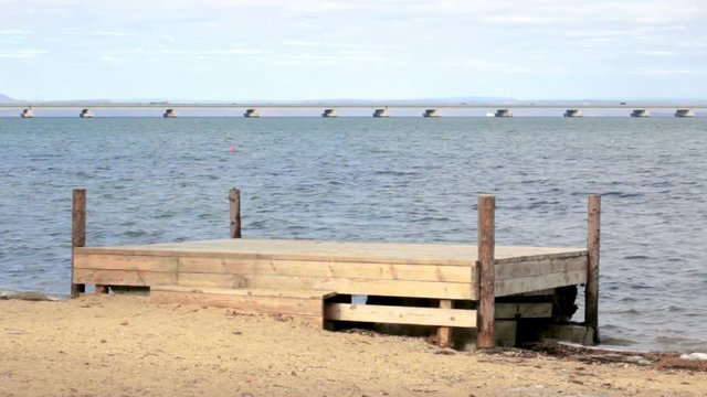 A view from the shore of a low-water bridge from the Sedanka station to the De Friz peninsula through the Amur Bay in the far east city of Vladivostok.