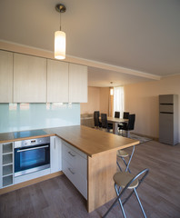 7501176 Modern home interior. Fitted kitchen in the house. The interior of the room.