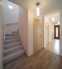 Wooden staircase in modern house. 
