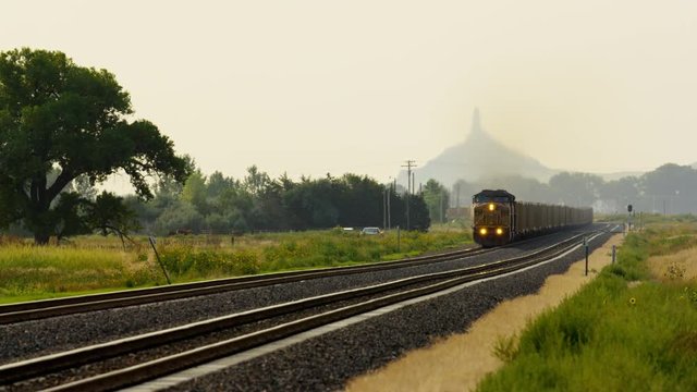 Diesel freight train locomotive near Chimney Rock Nebraska USA