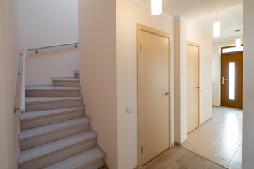 Wooden staircase in modern house. 