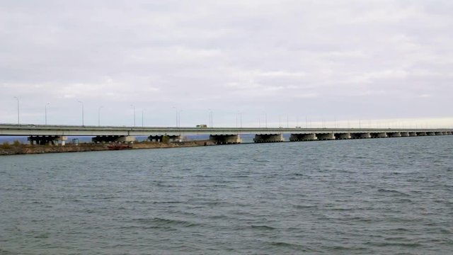 A view from the shore of a low-water bridge from the Sedanka station to the De Friz peninsula through the Amur Bay in the far east city of Vladivostok.
