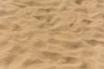 The brown sand pattern on the beach