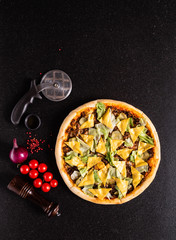 pizza on black background
