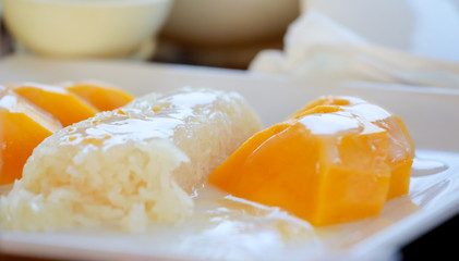 mango and sticky rice,Thai style tropical dessert, glutinous rice eat with mangoes