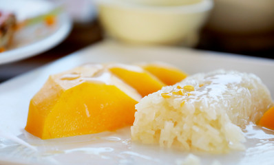 mango and sticky rice,Thai style tropical dessert, glutinous rice eat with mangoes
