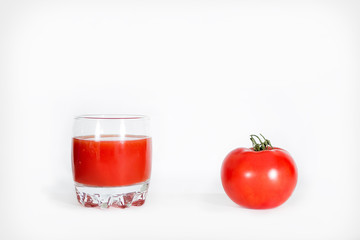 tomato and tomato juice on a white background