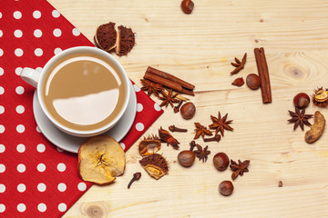 Coffee cup with saucer on a wooden background top view