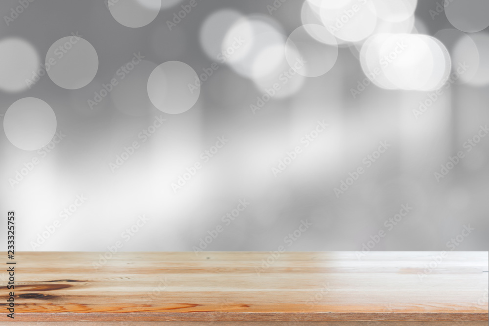 Canvas Prints wooden desk with blurred light bokeh abstract background