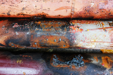 Texture of Burned steel and Metal pipe.Weld pipe and alloy steel.