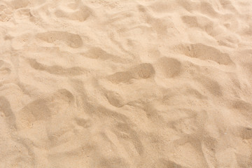 Obraz na płótnie Canvas Sand background and texture in summer sun as background