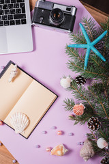 Calendar and tropical leave on blue background. Holiday and travel plan.