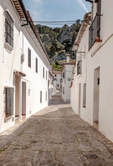Streets of Grazalema with mountains in the background