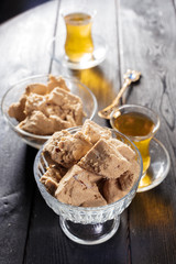 Tasty halva with tea on the table