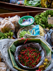 floating Market in Thailand and take a boat then have a great tour at Floating Market Damnoen Saduak, Thailand