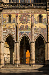 Obraz premium Golden gate entrance of cathedral of st. Vitus in Prague / Detail of the facade of the Metropolitan Cathedral of st. Vitus in Prague, Czech Republic.