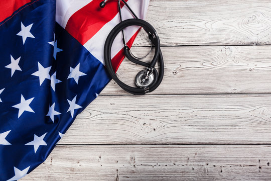 Close-up Photo Of Stethoscope On American USA Flag