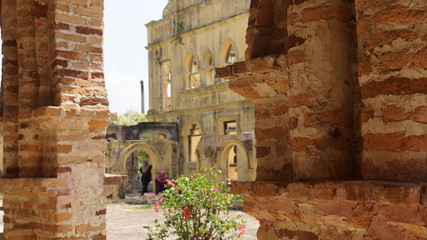 Exterior of unfinished abandoned mansion in Perak, Malaysia