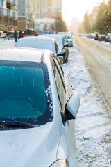 on the road cars covered with snow