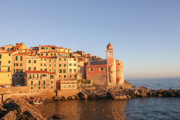 Fototapeta premium City and castle by the sea./The houses of the old town and the castle are located on a narrow cape jutting out into the sea.