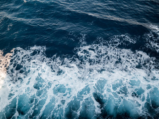 Wake on blue sea surface