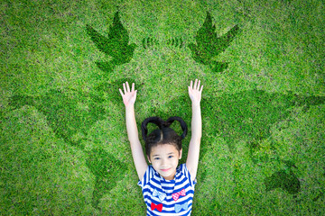 World peace day and International day of peace concept with peaceful mind kid resting in clean natural environment on eco friendly green lawn world map and dove
