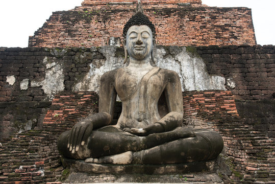 Buddha Statue at Wat Mahathat in Sukhothai Historical Park, Unesco world heritage. of Thailand .