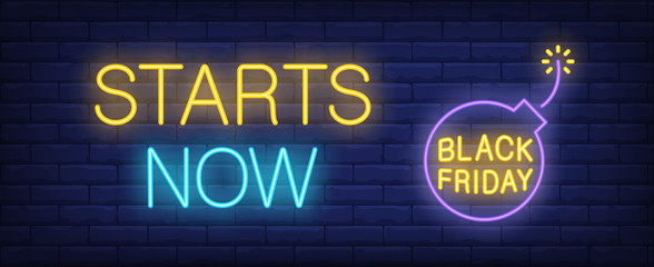 Starts now neon text and bomb with lit fuse. Offer and sale advertisement design. Night bright neon sign, colorful billboard, light banner. Vector illustration in neon style.