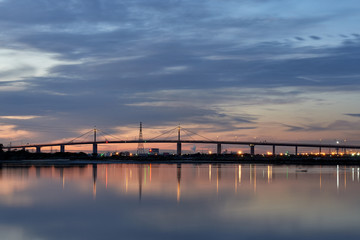 Naklejka na ściany i meble Westgate Bridge at sunset over the Yarra River in Melbourne, Australia.