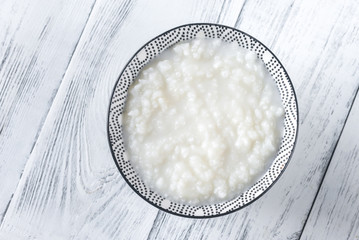 Bowl of congee - Asian rice porridge - obrazy, fototapety, plakaty