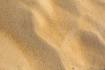 Fototapeta na wymiar Texture of beach sand as background.