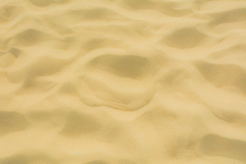 Texture of beach sand as background.