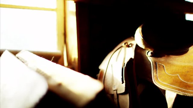 Cowboy saddle in Corral barn western Dude Ranch 