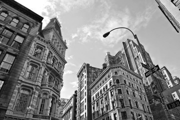 New York USA  buildings, modern and old architecture, street, colorful facade and blue cloudy sky in manhattan midtown in new york