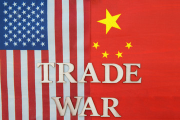 Flags China and America US trade war tariffs contradict two opposite trading partners of the economic concept of import and export.